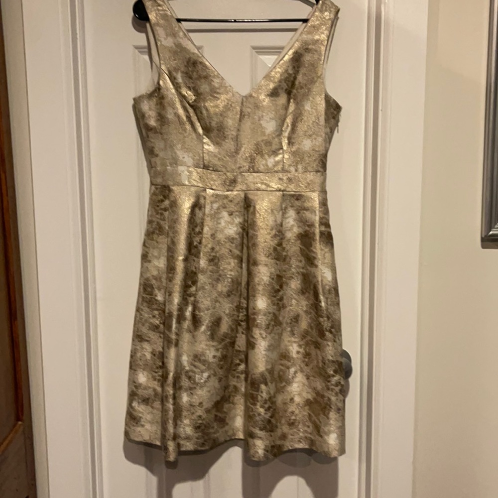 Super nice well made dress. Side zipper side slip hidden pockets.